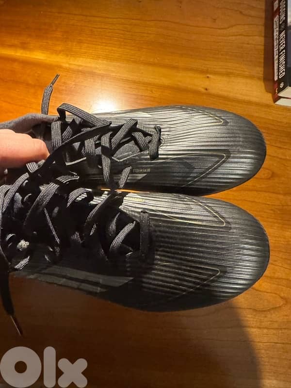 Adidas F50 football shoes black and gold 1