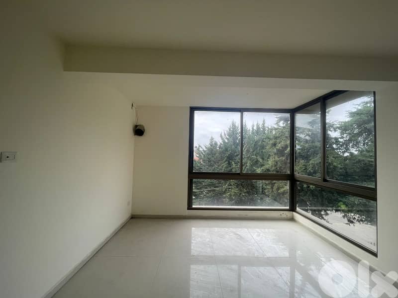 RWK170JS - Apartment for sale in Ballouneh 0