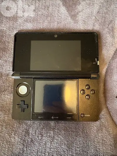Nintendo 3ds with charger and original pencil