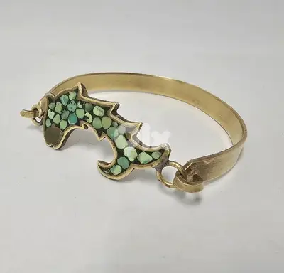 8$ turquoise stone inlay in copper bracelet