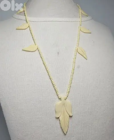8$ necklace made from camel or bovine bone
