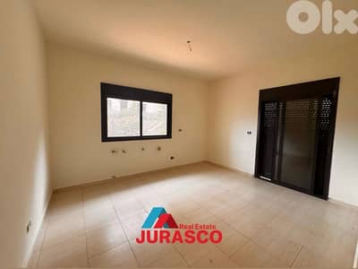 apartment for sale in ballouneh 216m + garden /شقة للبيع في بلونة 216