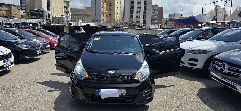 Kia Rio hatchback 2014  f. o ABS AIRBAG RIMS like new 0