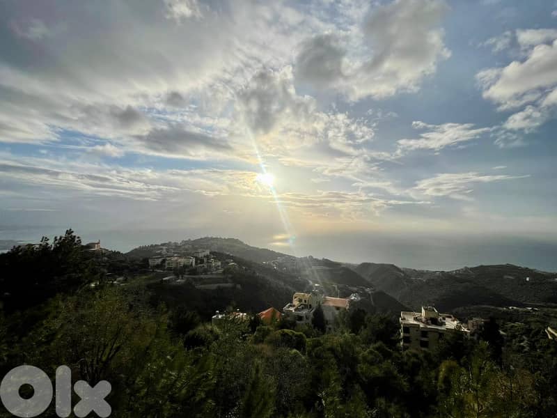 930 SQM Land in Kfour with a Breathtaking Sea View 0