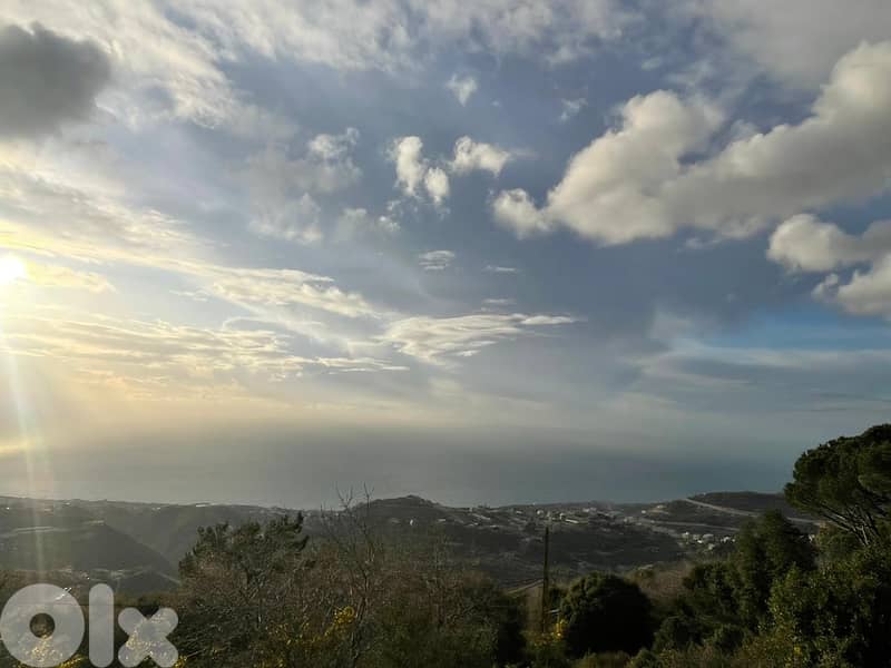 930 SQM Land in Kfour with a Breathtaking Sea View 0