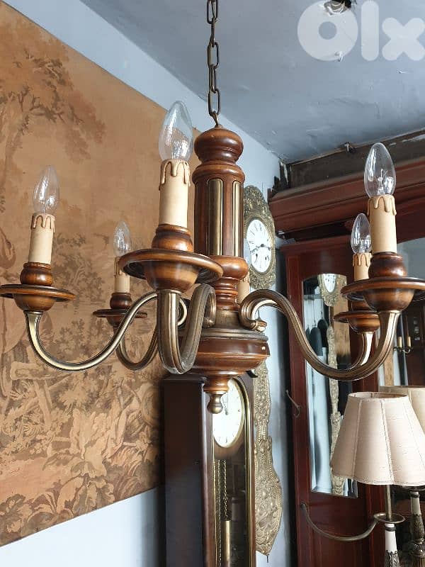 european heavy wood and brass flemish chandelier 1