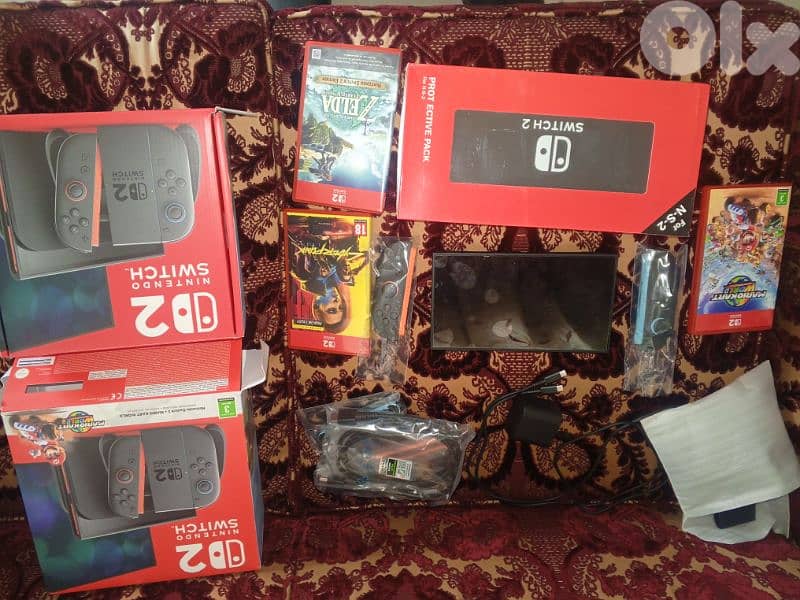 switch 2 like new with 2 games online subscription 1 year Zelda not included or trade with ps5 slim or fat 1