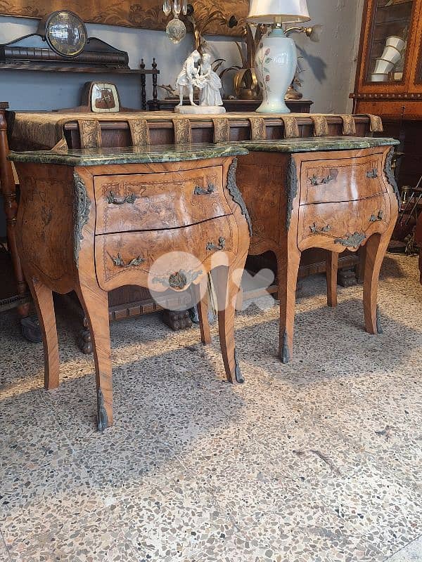 pair of marble top bahue 1