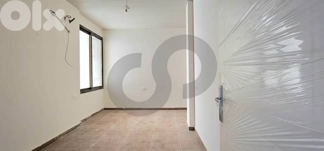 A newly built apartment in Qornet el Hamra/ قرنة الحمراء REF#OU134774