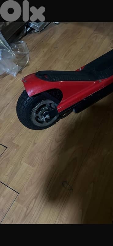 red used electric scooter 1
