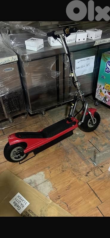red used electric scooter 3