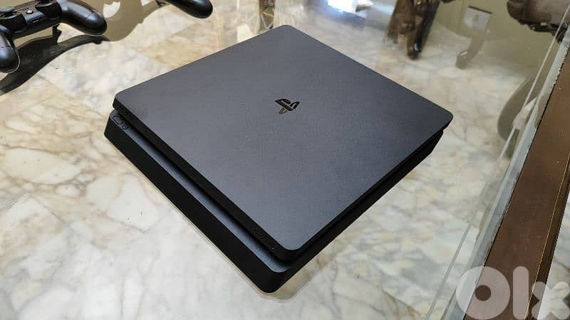 Used PS4 with 2 controllers and a bunch of cd games 0