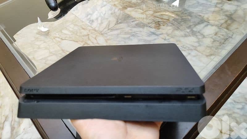 Used PS4 with 2 controllers and a bunch of cd games 2