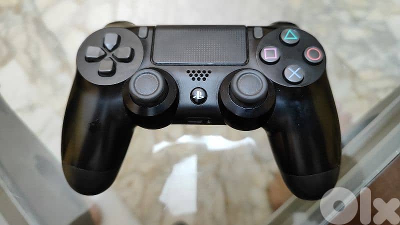 Used PS4 with 2 controllers and a bunch of cd games 4