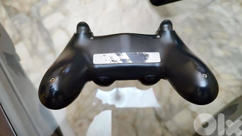 Used PS4 with 2 controllers and a bunch of cd games 7