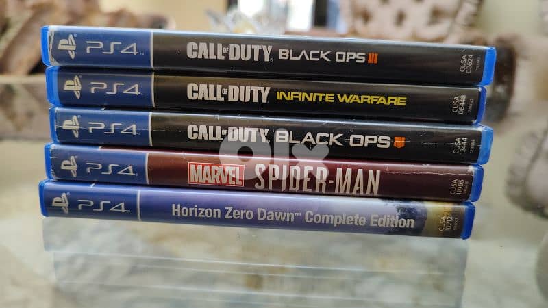 Used PS4 with 2 controllers and a bunch of cd games 9