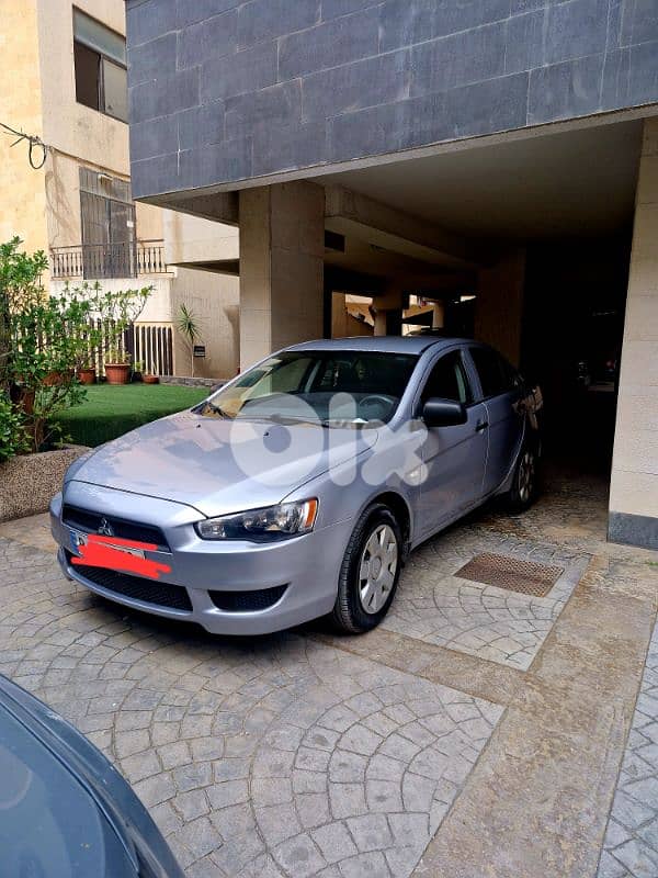 Mitsubishi Lancer 2011 1 owner 63000km company source 0
