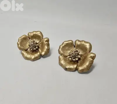 8$ gold tone vintage earrings