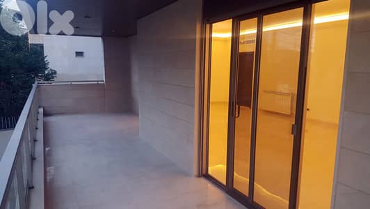 L20938- Spacious Apartment With Backyard Terrace For Sale in Mar Takla