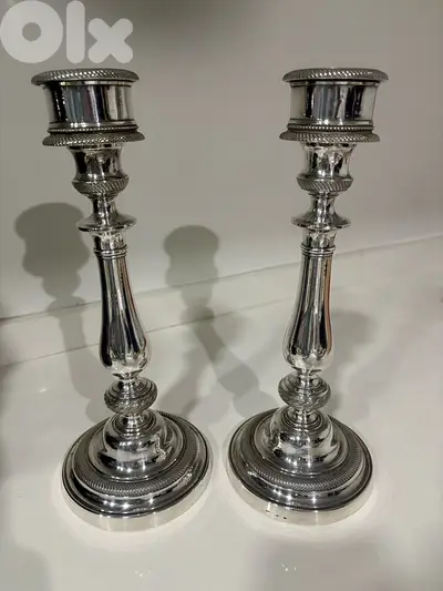 Paire de bougeoirs en argenterie Morlot