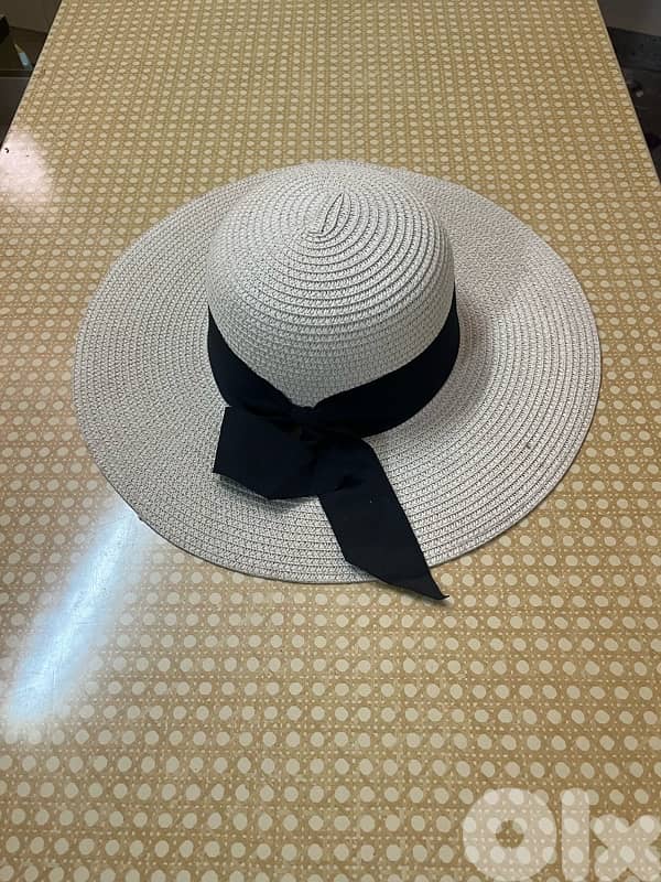 White woven straw floppy woman’s hat 0