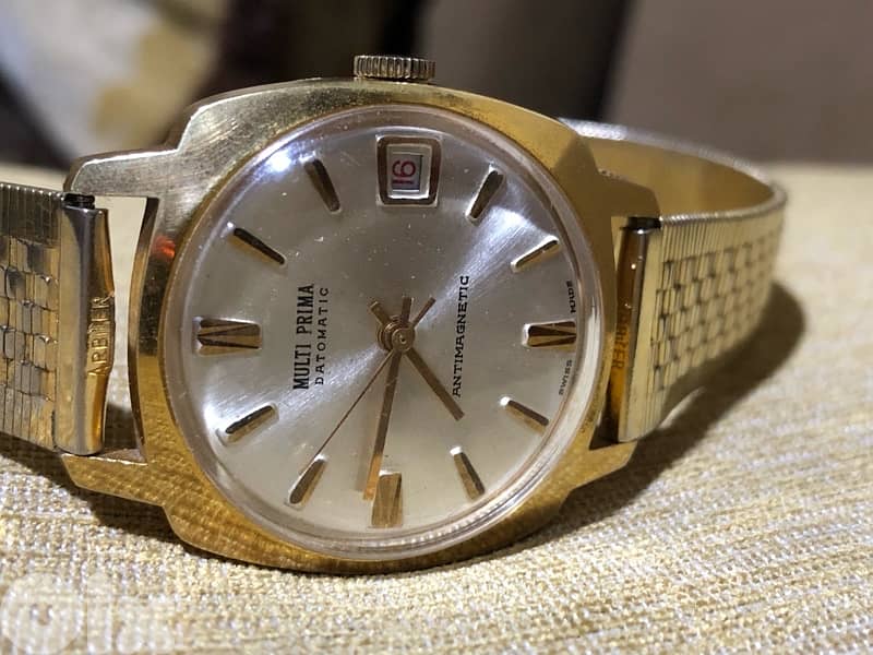 MULTI PRIMA DATOMATIC MANUAL ANTIMAGNETIC SWISS MADE 1970  ساعة ربط 1