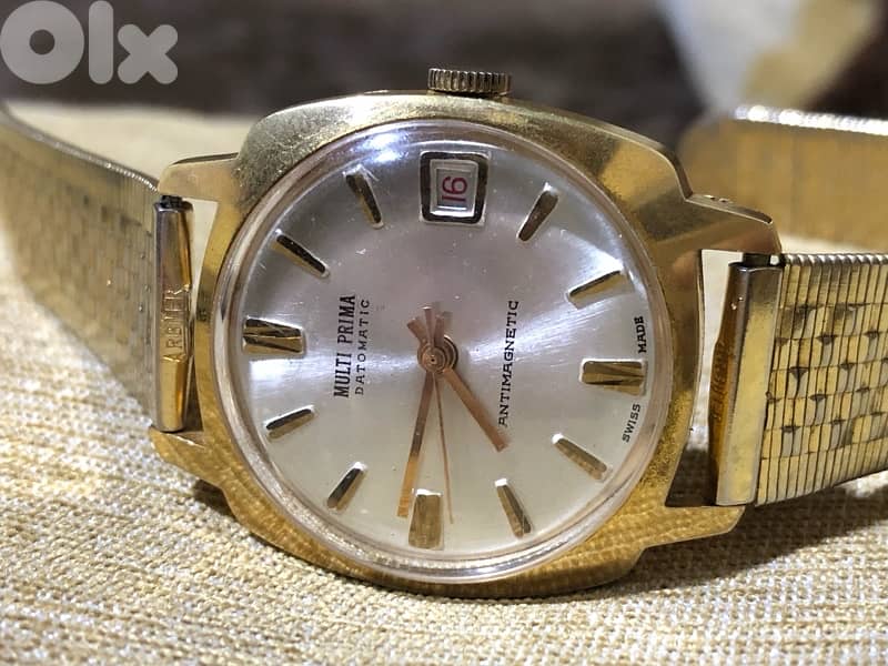 MULTI PRIMA DATOMATIC MANUAL ANTIMAGNETIC SWISS MADE 1970  ساعة ربط 3