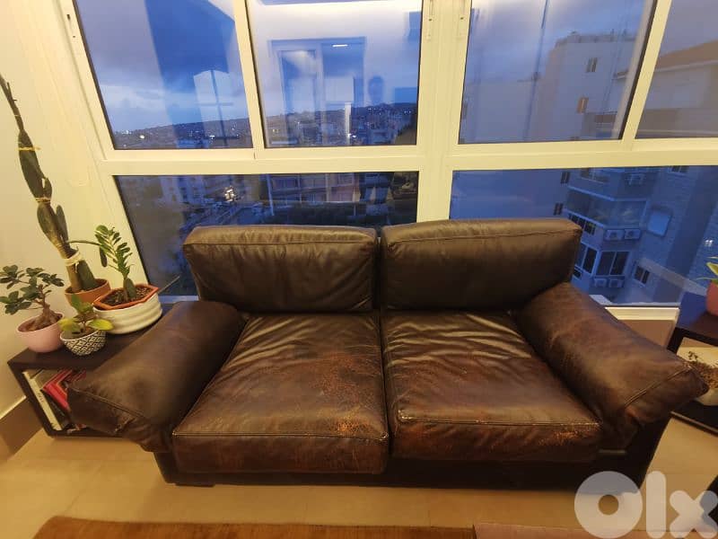 one 2 seater and one 3 seater leather sofas 0