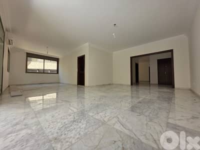 L20974 - Spacious Apartment With Backyard Terrace For Sale in Hazmieh