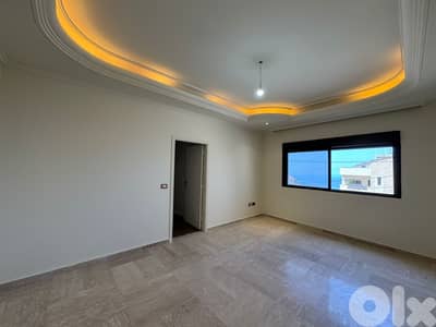 L21011 - Exclusive! Spacious Apartment For Sale in Ain Saadeh