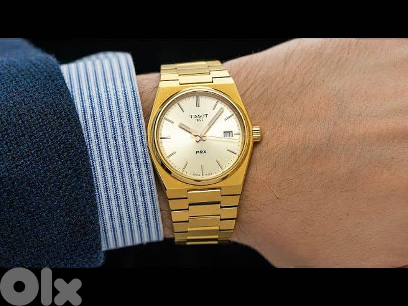 Gold Tissot PRX 0