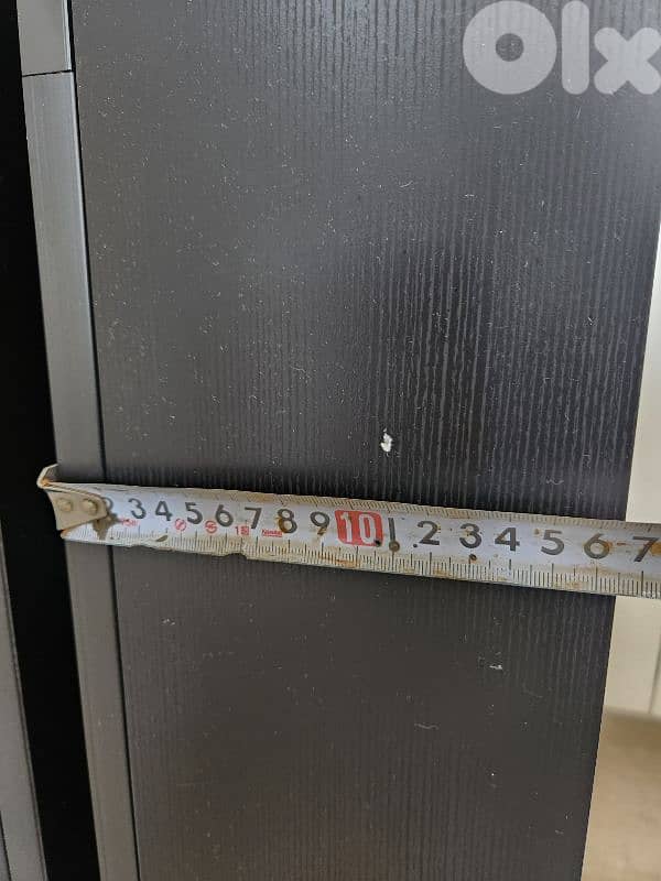 bathroom storage box with a black mirror door. 7