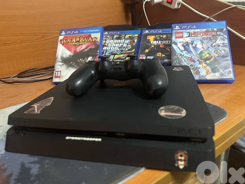 PS4 slim used but in good comdition with 4 games 0