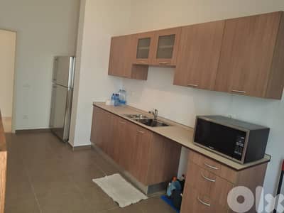 L21052 - Furnished Apartment with Garden For Sale in Aoukar Bellevue