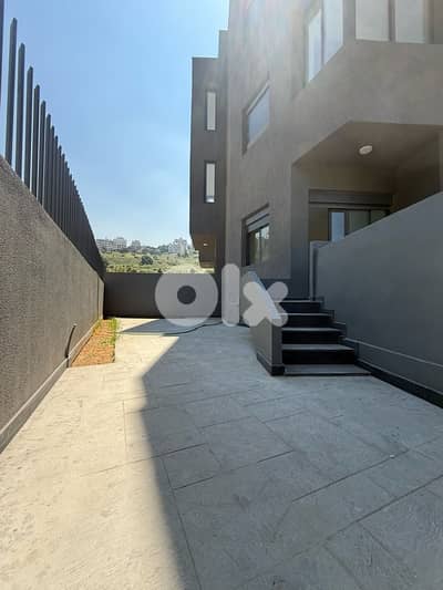 Sunny Apartment for Sale in Fanar with open sea view and terrace.
