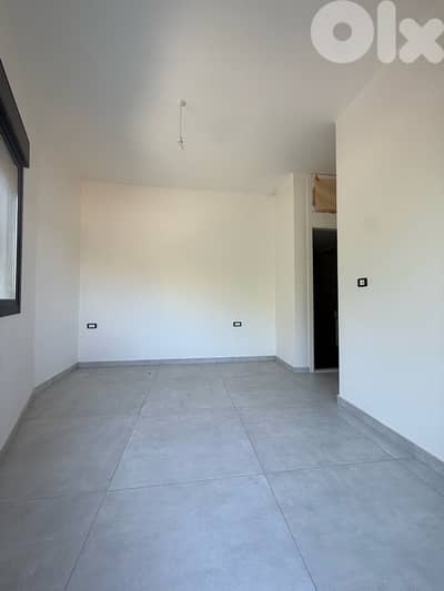 Sunny Apartment for Sale in Fanar with open sea view and terrace.