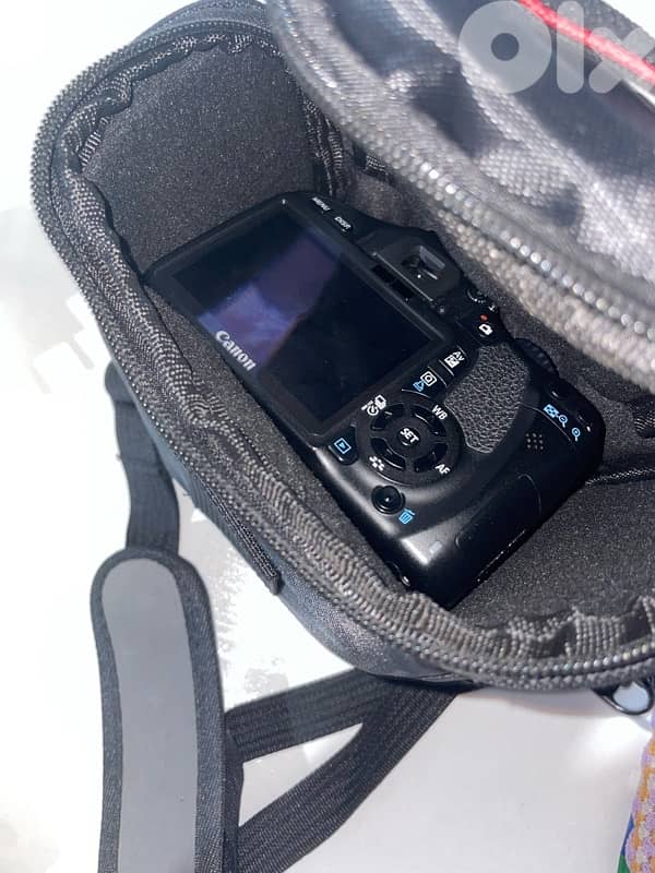 canonEOS550 with EFS18-55mm canon lens,a bag,charger,and 128GB sandisk 2