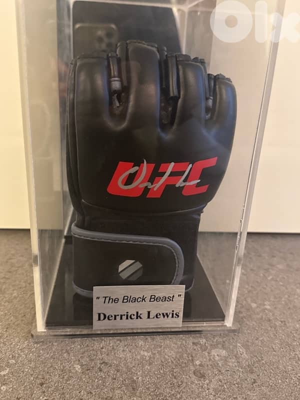 Signed UFC Glove by Derrick Lewis 0