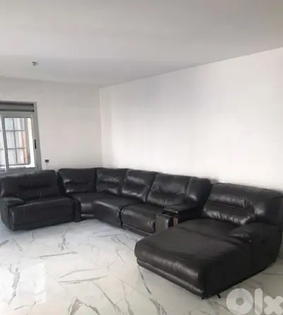 Dark brown leather recliner sofa