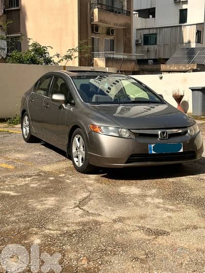 Honda Civic 2006 full option + fat7a bel sa2ef + original screen