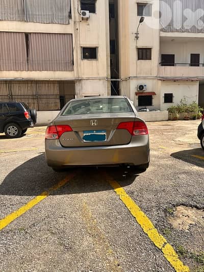 Honda Civic 2006 full option + fat7a bel sa2ef + original screen