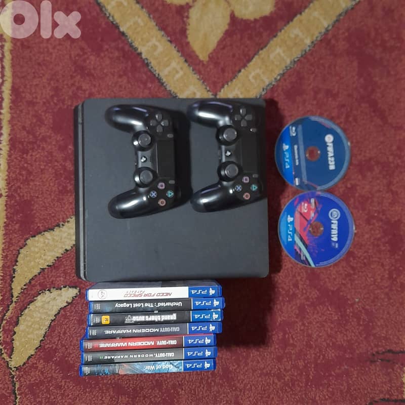 Ps4 slim 1TB & 9 cds 1 digital 0