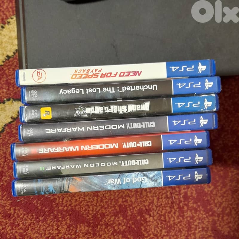 Ps4 slim 1TB & 9 cds 1 digital 1