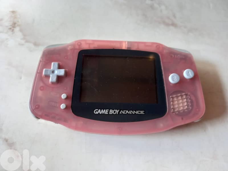 Nintendo Game Boy Advance handheld console in the clear pink color 0