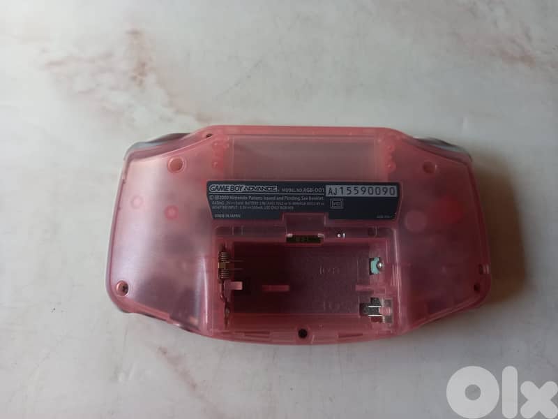 Nintendo Game Boy Advance handheld console in the clear pink color 1