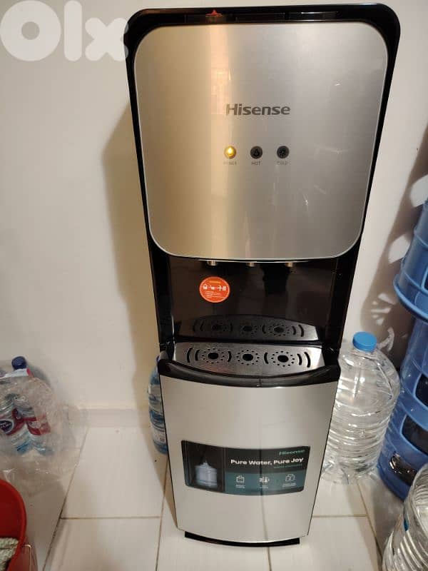 hisense water dispenser bottom load  6 months warranty 0