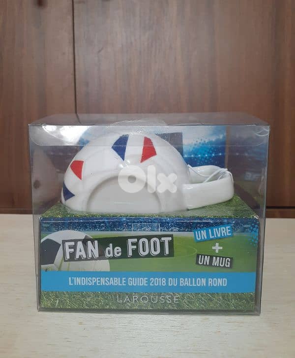 Football Mug + booklet. 1