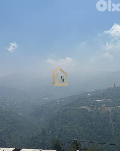 Land for sale in Ballouneh RKKG40 أرض للبيع في بلونيه