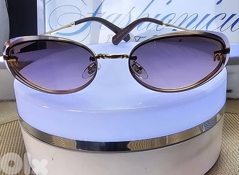 Miu Miu Sunglasses 0