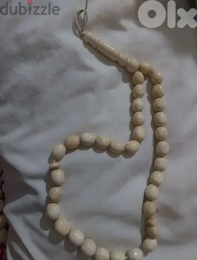 مسبحة عاج افريقي ٣٣ حبة وزن ٦٠ غرام
